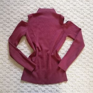 Pull with open shoulders.  Burgundy color s cowl